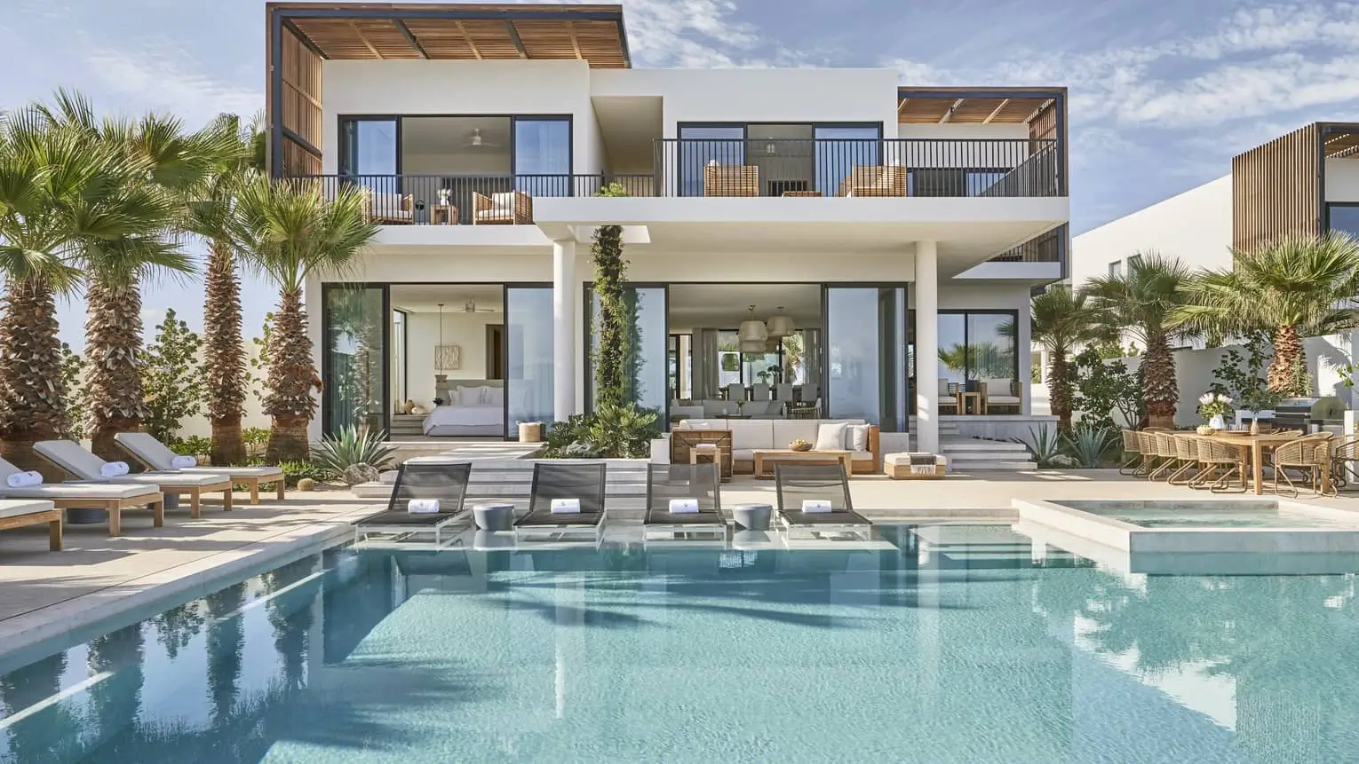 Luxury Four Seasons Cabo homes for sale featuring oceanfront modern architecture and exclusive resort living in Los Cabos